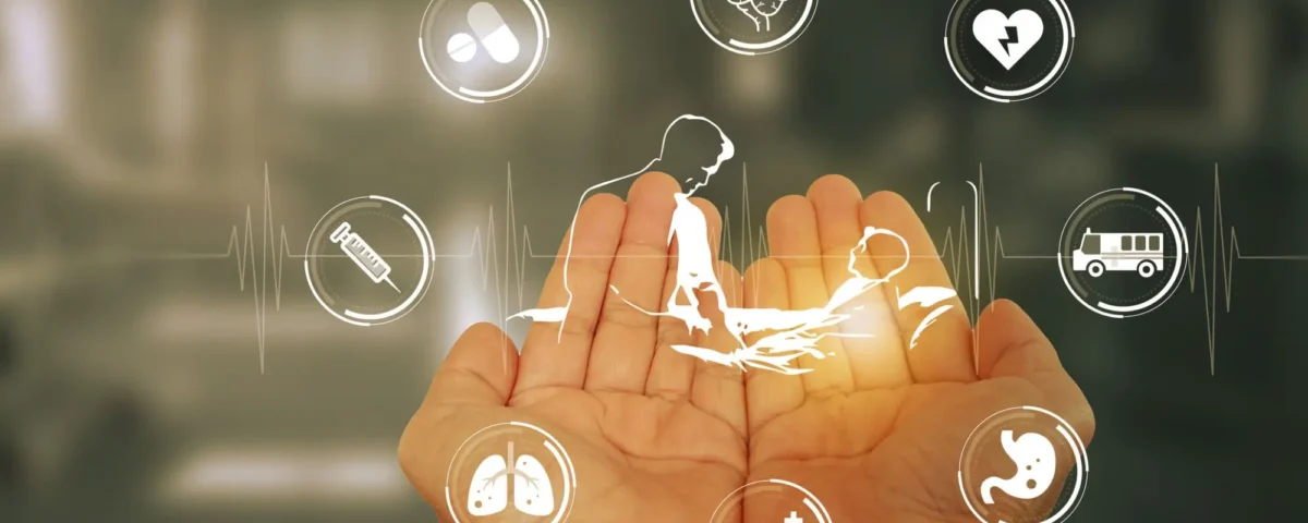 digital medical icons hovering over two open hands