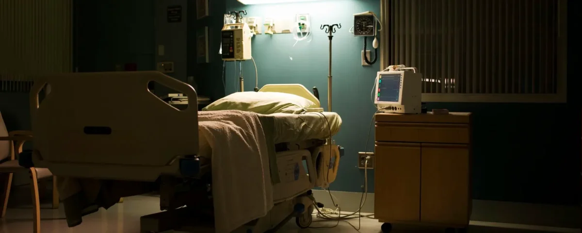 Hospital room with bed, monitors and life monitoring equipment