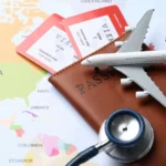 airplane, passport, stethoscope, world map